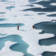 Illustration for article titled Melt Ponds on Ice Sheets Are Chillingly Beautiful